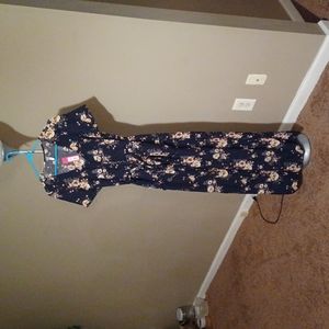 Black jumpsuit with gold and white flowers